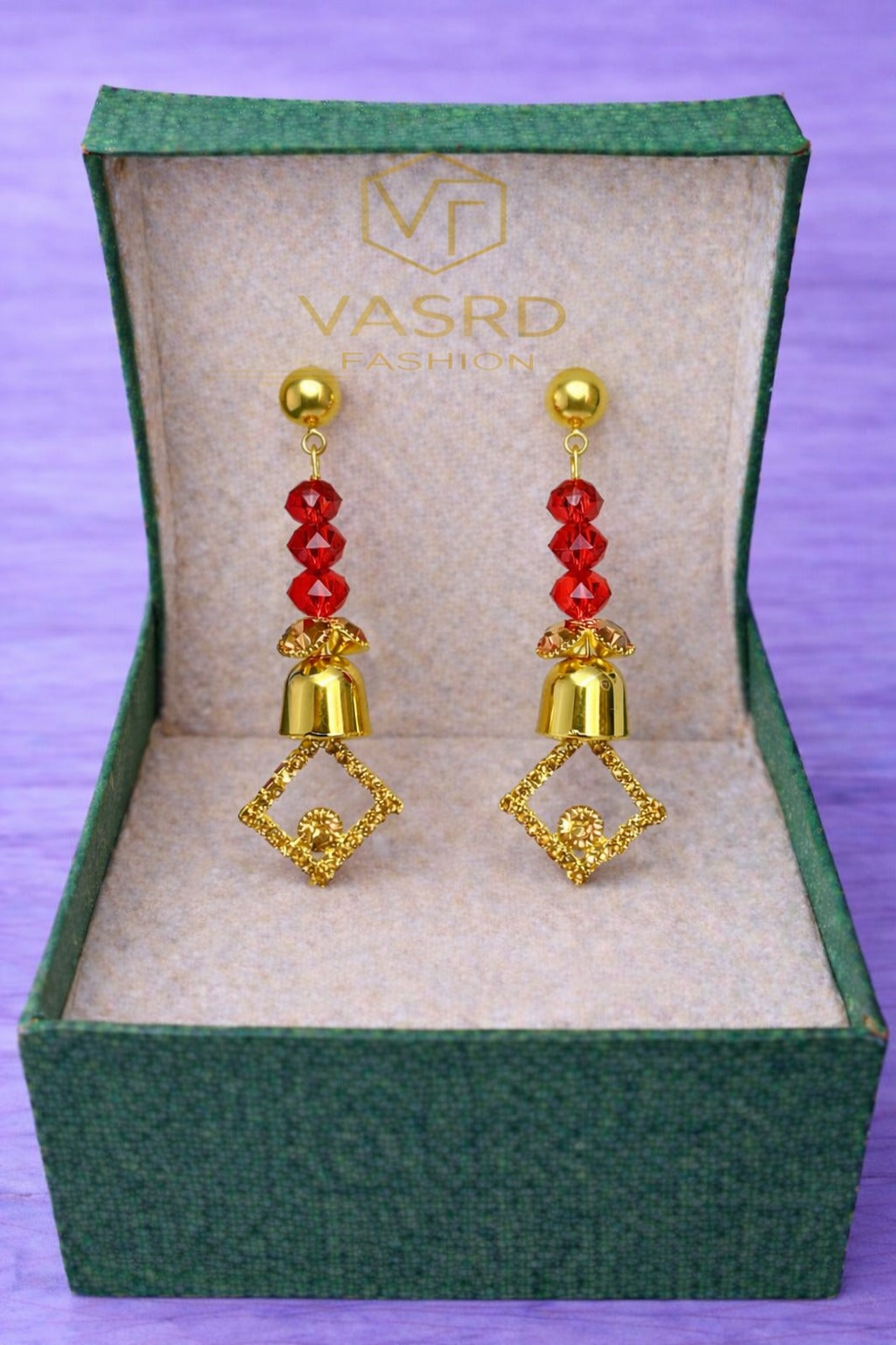 Golden Geometric Drop Earrings with Red Crystal Beads