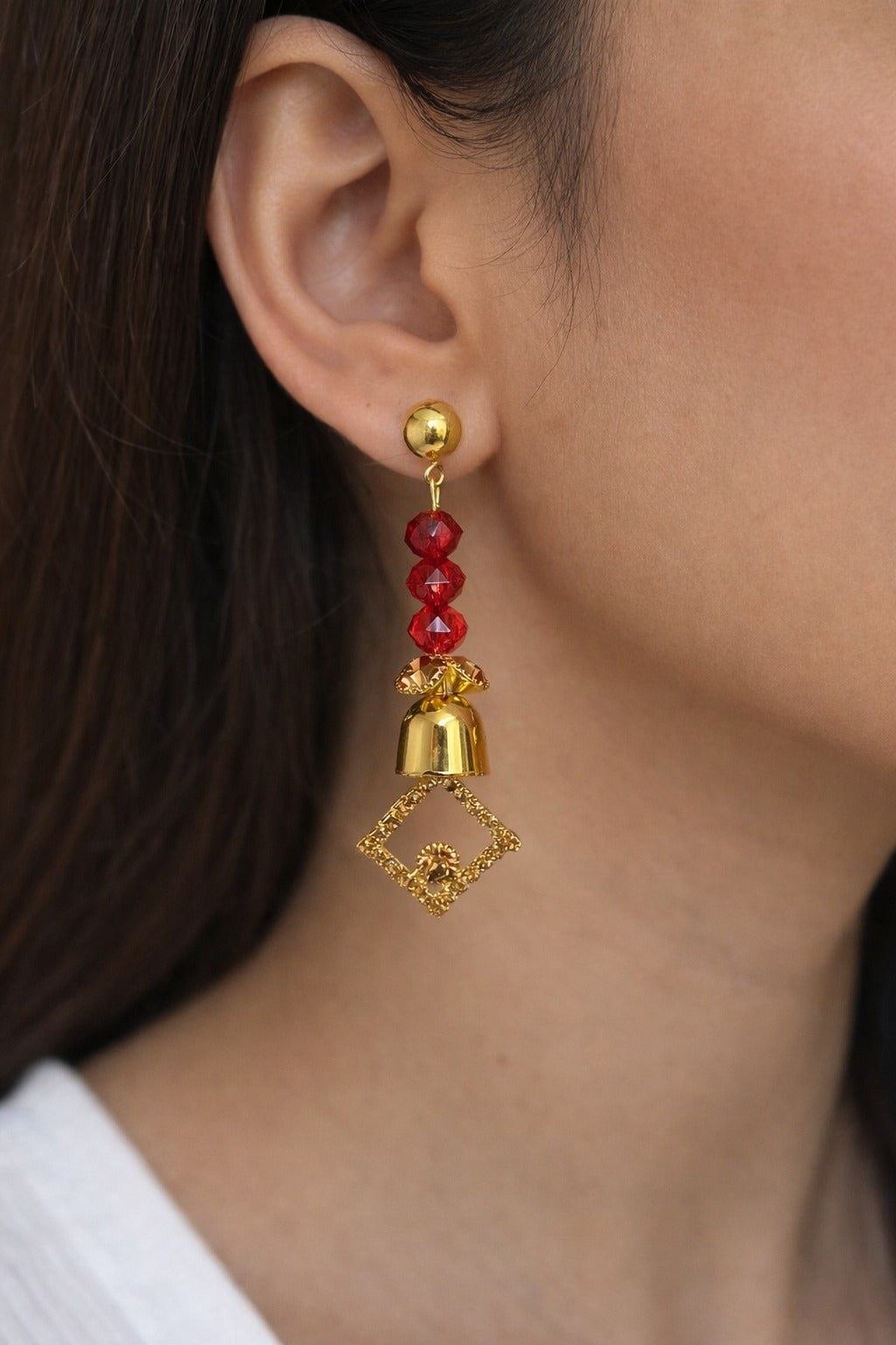Golden Geometric Drop Earrings with Red Crystal Beads
