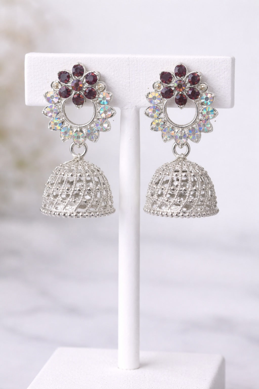 Floral Crystal Silver Jhumka Earrings with Maroon Stones and Intricate Dome Design