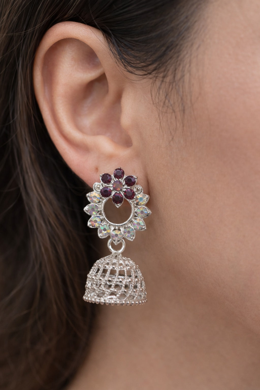 Floral Crystal Silver Jhumka Earrings with Maroon Stones and Intricate Dome Design