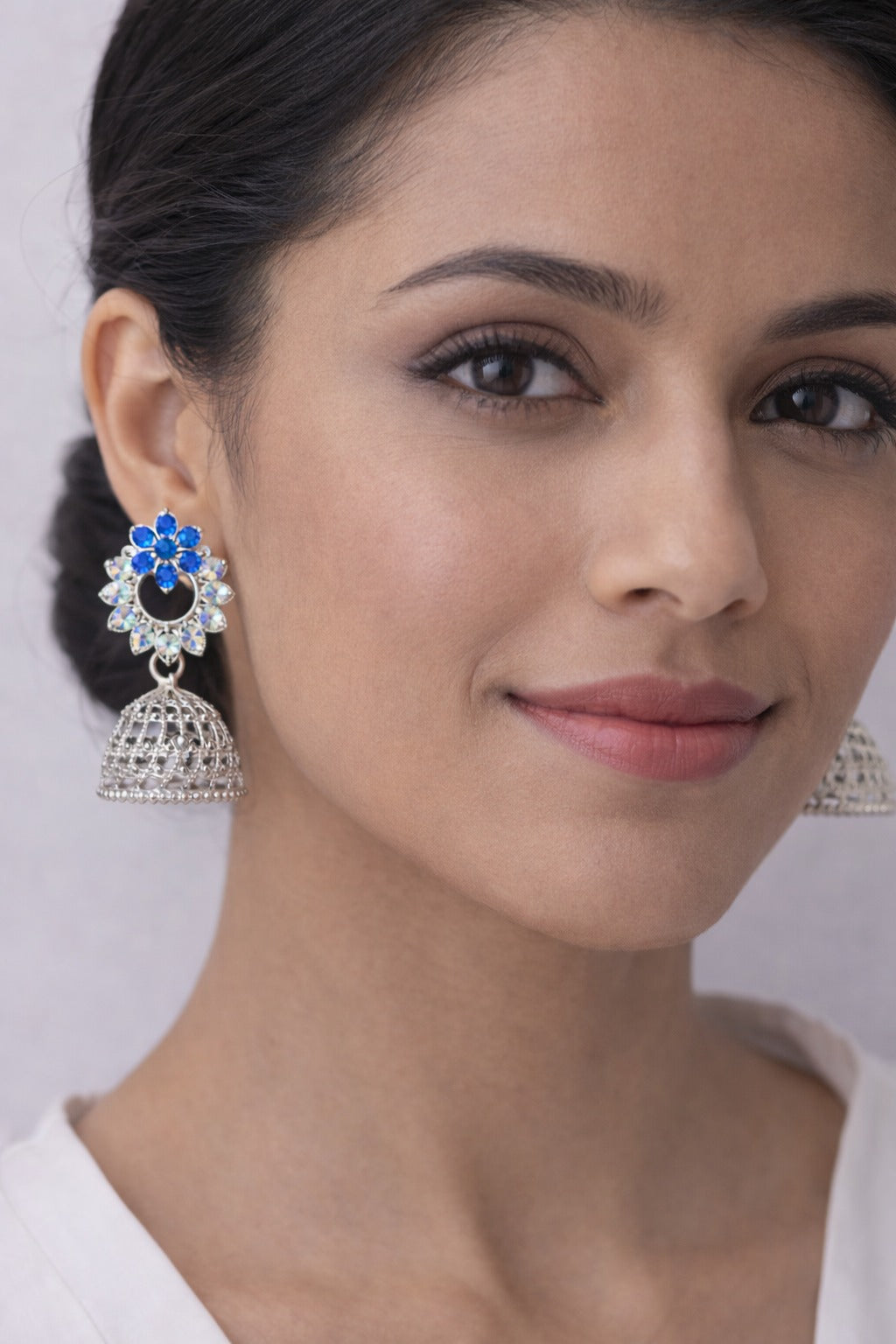 Sky Blue Crystal Floral Silver Jhumka Earrings