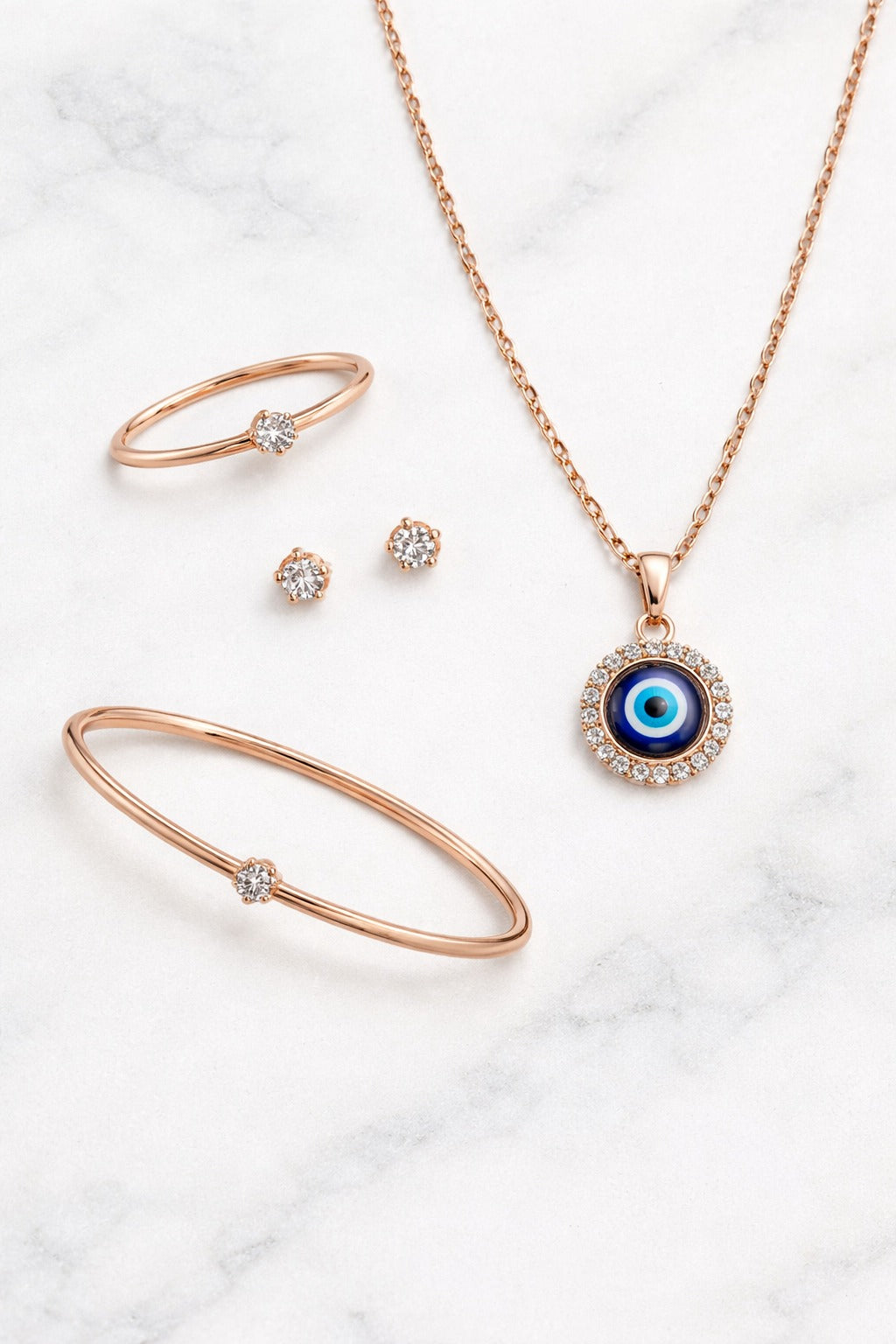 Elegant Evil Eye Rose Gold Jewelry Set with CZ Stones – Necklace, Bracelet, Ring & Stud Earrings