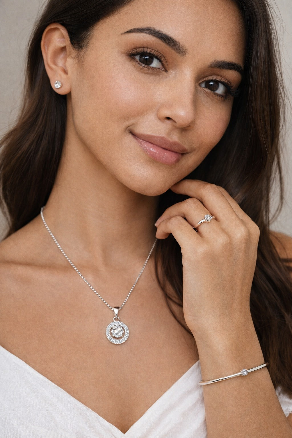 Elegant Silver-Tone CZ Jewelry Set – Pendant Necklace, Bracelet, Ring & Stud Earrings